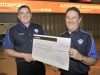 Paul Whyte and Roland Proudlock with cheque received at the 2013 Autosport Show