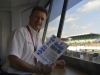 full-chat-fan-and-world-sports-car-champion-allan-mcnish-keeps-up-to-date-at-le-mans-2014-rolypix